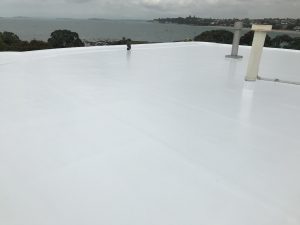 Silicone roof coating on flat roof
