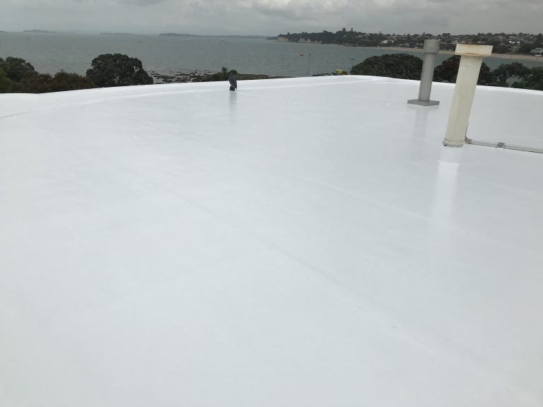 Silicone roof coating on flat roof